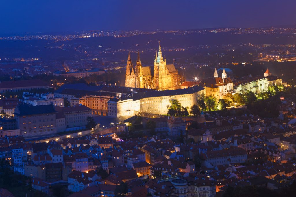 Prague, Czech Republic. Night View Of Prague Castle, St. Vitus Cathedral. Lesser Town, Prague Castle In Night Lighting Illumination. Famous Landmark, UNESCO World Heritage.